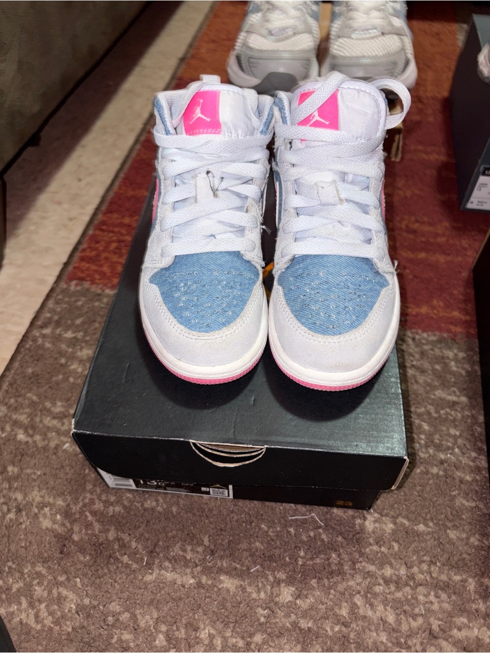 Jordan 1 Kids White and Light Blue Sneakers with Pink Logo Accents
